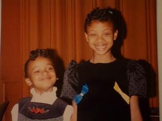 Alexandria Boddie, on the right, after her first piano recital with her sister April standing beside her.