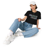 Liz Tran sitting on a bench wearing a black crop top with 'Eccentric Auntie' text in size small from The Iris Collection by Alexandria Boddie and Liz Tran.